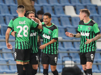 Domenico Berardi of U.S. Sassuolo Calcio celebrates after scoring a goal with his team mates during the Serie A match between U.S. Sassuolo...