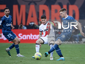 Fran Garcia of Rayo Vallecano looks to pass the ball during a match between Rayo Vallecano v Girona FC as part of LaLiga in Madrid, Spain, o...