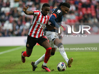 Sunderland's Abdoullah BA takes on Luton Town's Gabriel Osho during the Sky Bet Championship match between Sunderland and Luton Town at the...