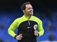 The referee Darren England warming up before during the Premier League match between Chelsea and Everton at Stamford Bridge, London on Satur...