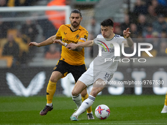 Leeds United's Marc Roca and Rben Neves of Wolves during the Premier League match between Wolverhampton Wanderers and Leeds United at Moline...