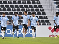Jacinto Dala (2-L) of Al Wakrah SC celebrate after scoring during the QNB Stars League match between Al Wakrah SC and Al Ahli SC at the Saou...