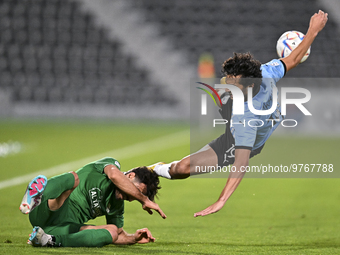 Mohamed Khlied Hassan (R) of Al Wakrah SC and Shojae Khalilzadeh (L) of Al Ahli SC battle for the ball during the QNB Stars League match bet...