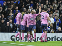 Everton players celebrating the team's first goal during the Premier League match between Chelsea and Everton at Stamford Bridge, London on...