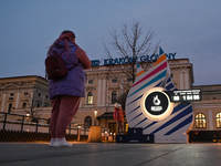 KRAKOW, POLAND - MARCH 15, 2023:EG2023 countdown clock located outside the old terminal of Krakow main train station shows 100 days to the...