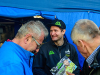 Johann Weber (16) (Germany) with fans before the meeting during the Ice Speedway Gladiators World Championship Final 1 at Max-Aicher-Arena,...