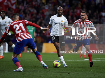 Dimitri Foulquier of Valencia CF runs with the ball during a match between Atletico de Madrid v Valencia CF as part of LaLiga in Madrid, Spa...