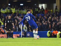 Kai Havertz of Chelsea shoots from the penalty spot during the Premier League match between Chelsea and Everton at Stamford Bridge, London o...