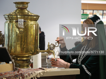 Iranian women serve tea from a traditional samovar during Nevruz celebrations in Toronto, Canada, on March 18, 2023. Nevruz (Norooz, Nourooz...