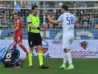The referee Gianluca Manganiello talks to Christian Diego  Pastina (Benevento) during the Italian soccer Serie B match AC Pisa vs Benevento...
