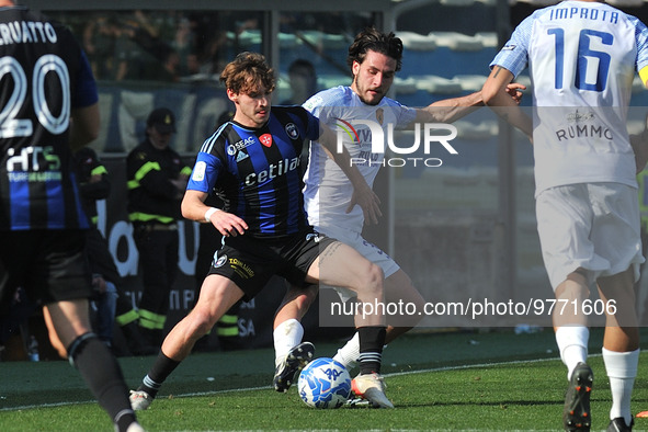 Matteo Tramoni (Pisa) thwarted by Maxime  Leverbe (Benevento) during the Italian soccer Serie B match AC Pisa vs Benevento Calcio on March 1...