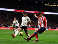 Alvaro Morata and Eray Comert during La Liga match between Atletico de Madrid and Valencia CF at Civitas Metropolitano on March 18, 2023 in...