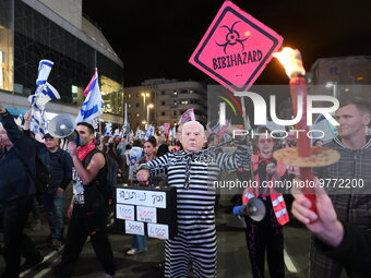 Thousands of Israeli protesters rally against Israeli Goverment's judicial overhaul bills in the coastal city of Tel Aviv on March 18, 2023....