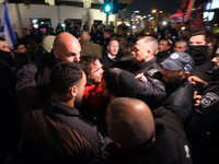 Israeli Police detains a Right Wing activists who confronted Israeli protesters who participated a rally against Israeli Goverment's judicia...