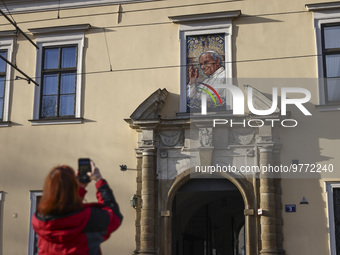 A mosaic image of Pope John Paul II in the 'Papal Window' at the Bishop's Palace in Krakow, Poland on March 18, 2023. Poland's parliament ha...