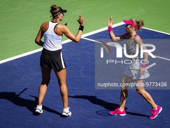 Beatriz Haddad Maia of Brazil & Laura Siegemund of Germany in action during the doubles semi-final of the 2023 BNP Paribas Open, WTA 100...