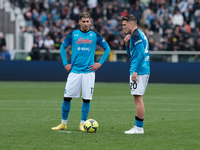 Piotr Zielinski and Mathias Olivera during Serie A match between Torino v Napoli in Turin, on March 19, 2023  (