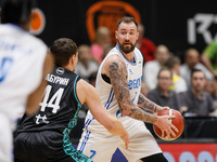 Sergey Karasev (R) of Zenit in action during the Russian Cup Final Four final basketball match between Pari Nizhny Novgorod and Zenit St. Pe...