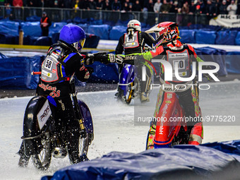 Stefan Svensson (58) congratulates Harald Simon (50) on his heath win during the Ice Speedway Gladiators World Championship Final 2 at Max-A...