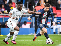 Arnaud KALIMUENDO of Rennes and Lionel (Leo) MESSI of PSG during the French championship Ligue 1 football match between Paris Saint-Germain...