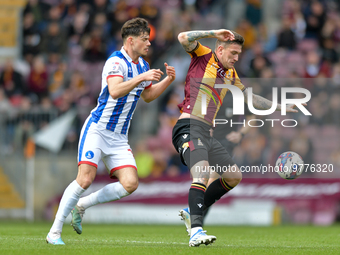 Hartlepool United's Edon Pruti looks to get the ball fromBradford City's Andy Cook during the Sky Bet League 2 match between Bradford City a...
