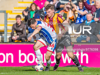 Connor Jennings #36 of Hartlepool United in a tussle with Matty Platt #5 of Bradford City during the Sky Bet League 2 match between Bradford...