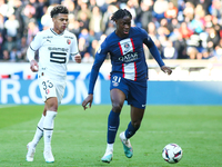 El Chadaille Bitshiabu of Paris Saint - Germain in action during the French Ligue 1 football match between Paris Saint-Germain (PSG) and Sta...