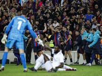 Real Madrid players defeated after while FC Barcelona players celebrates the victory during the ''El Clasico'' La Liga match between FC Barc...