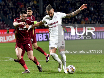 Andrei Burca (L) and Marko Duganzic (R) in action during Romania Superliga1 Play-off: CFR Cluj vs FC Rapid, disputed on Dr Constantin Radule...