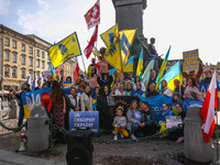 Ukrainian citizens and supporters attend a daily demonstration of solidarity with Ukraine at the Main Square on 389th day of Russian invasio...