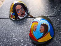 Hand-painted helmets with Ukrainian decorations are seen during a daily demonstration of solidarity with Ukraine at the Main Square on 389th...