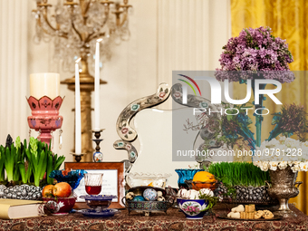 The haft-seen table is prepared for a Nowruz reception at the White House.  The table contains seven items that begin with the letter “seen,...