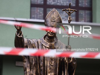 A statue of pope John Paul II standing in front of St. Hedwig Church in Pszczyna, Silesia region of Poland on March 20, 2023. Poland's parli...
