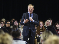 Donald Tusk, the leader of the largest opposition party, Civic Platform (PO), speaks to women during his visit in Pszczyna, Silesia region o...