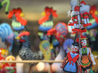 KRAKOW, POLAND - MARCH 20, 2023:
An assortment of hand-painted local craft products on display at the St. Jozef Fair in Krakow, Poland, on M...