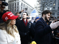 Gavin M. Wax, president of the New York Young Republican Club, speaks  as several people gather for a protest organized by Young Republicans...