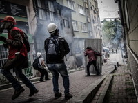 Turkish protesters during clashes with riot police who prevent demonstrators from reaching Taksim Square in Istanbul for a May Day rally on...