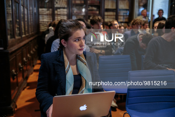 A student listening to the former Prime Minister Romano Prodi holds a lecture entitled, Italy in the global era: facing challenges in Europe...