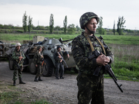 The Ukrainian Army and National Guard  blocking the road where once was a checkpoint of the pro-Russian near Slaviansk (