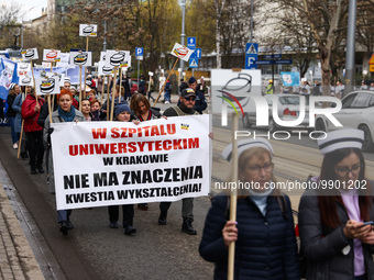 Polish nurses and midwives of hospitals from all the country take part in a protest marching through the streets of Krakow, Poland, on April...