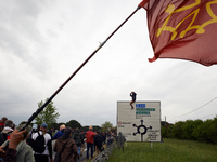 During the march. More than 8000 protesters marched 12km against the planned A69 highway. The collectives 'La Voie Est Libre' (ie 'The Way I...
