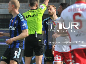 The referee Andrea Colombo shows yellow card to Giuseppe Sibilli (Pisa) during the Italian soccer Serie B match AC Pisa vs SSC Bari on April...