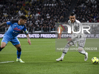 Juventus midfielder Filip Kostic (17) fights for the ball against Napoli defender Giovanni Di Lorenzo (22) during the Serie A football match...