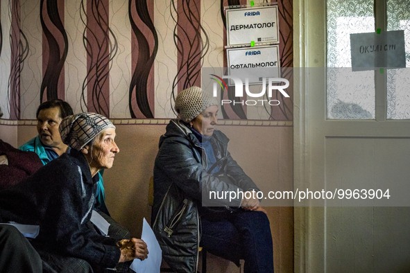 Locals of Pisky Radkivski and other villages around, on april 23, 2023, wait for medical consultaton by doctors of FRIDA NGO. FRIDA NGO is a...