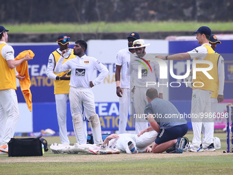 Paul Stirling of Ireland reacts to an injury during the first day of the second Test match between Sri Lanka and Ireland at the Galle Intern...