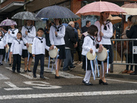 A group of ''Picayas'' (girls who accompany the Virgin with their songs and tambourines) are protected from the rain with umbrellas during L...