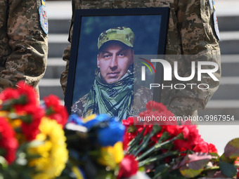 A portrait of Ukrainian servicemen Yurii Moroz is seen during his farewell ceremony at the Independence Square in Kyiv, Ukraine 24 April 202...