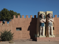 Egyptian statues by the entrance at the Atlas Film Studios in the High Atlas Mountains in Ouarzazate, Morocco, Africa. The Atlas Film Studio...