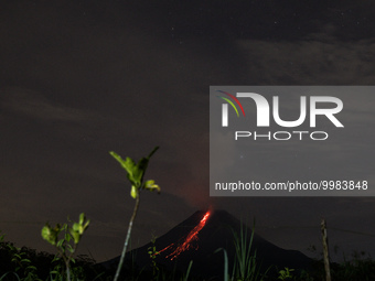 Mount Merapi, a volcanic mountain spews lava as it erupts several times as seen from Tunggularum village, Sleman district in Yogyakarta, Ind...