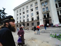 Police stand guard outside the Trade Union building Odessa. More then 30 people were killed after they were trapped inside the building. Man...